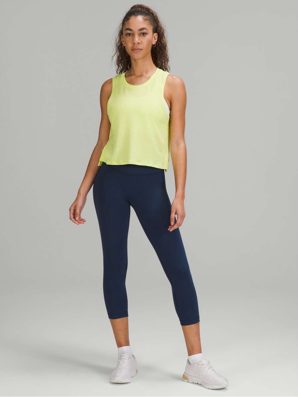 057. Lululemon Train to Be Tank Top
Ripple Wave Yellow Pear and white size 4